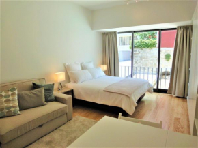 Гостиница Tiles Apartments  Atiães